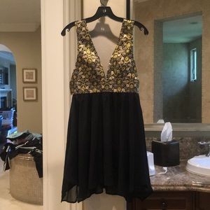 Black and gold metallic frilly flowy dress